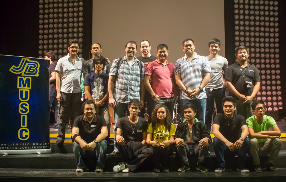 The gloryfall band, with JB Music, the organizers from COG Dasmarinas, and Ptr. Anthony